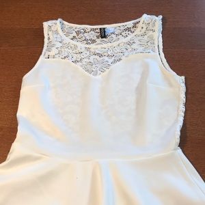 White lace back peplum shirt